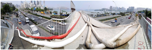 武汉市洪山区南湖小区内涝排渍抢险长沙迪沃排水设备跨越过街天桥应急排水场景
